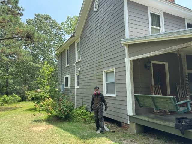 Home inspector Harrison conducting a professional property inspection.