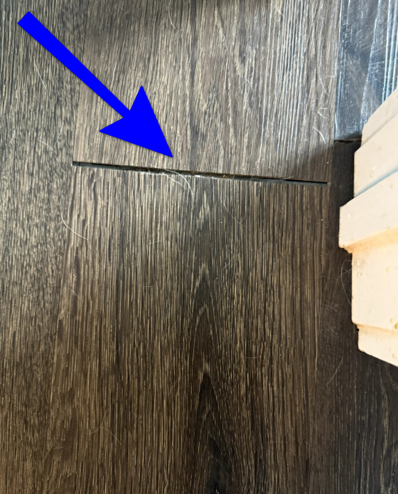 Substandard installation of interior floor covering.