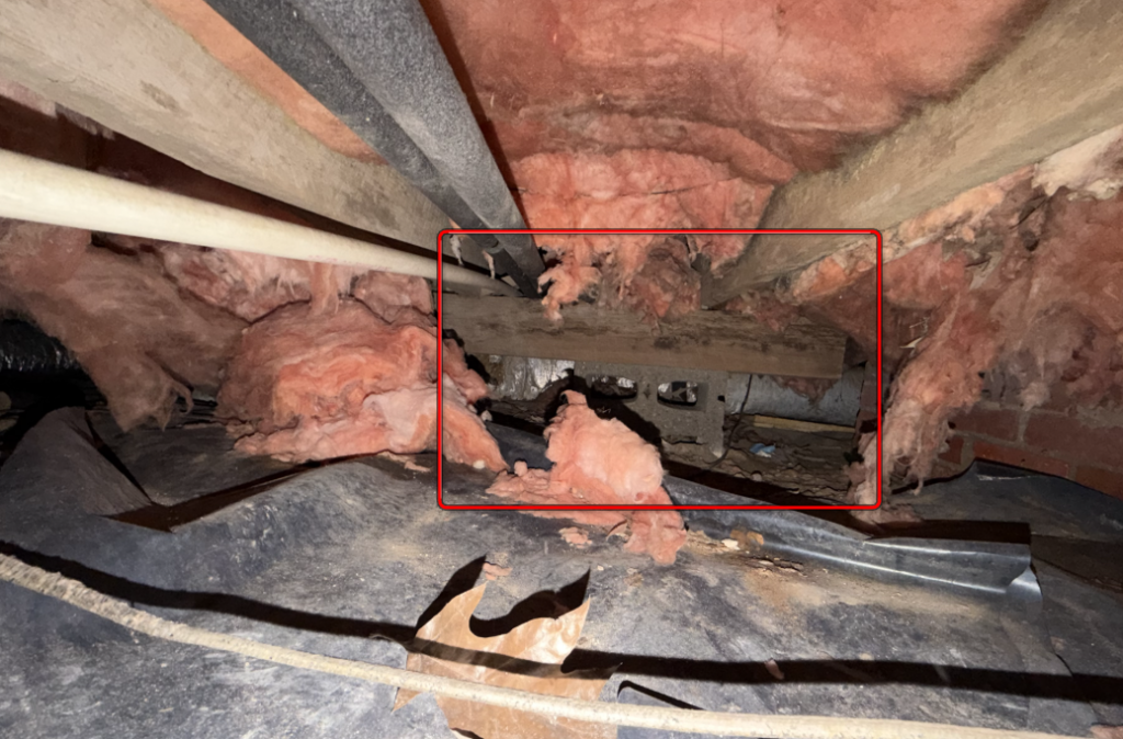 Sideways concrete masonry unit block used improperly for structural support.